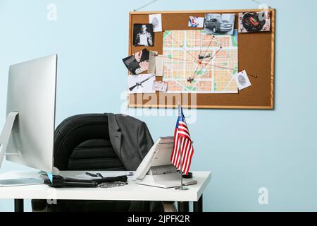 Modern detective office with workplace and board Stock Photo - Alamy