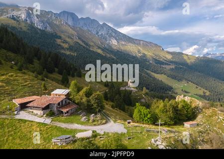 Baita Cornetto and the new bivouac, under the Presolana mountain, Castione della Presolana, Val Seriana, Bergamo district, Lombardy, Italy. Stock Photo