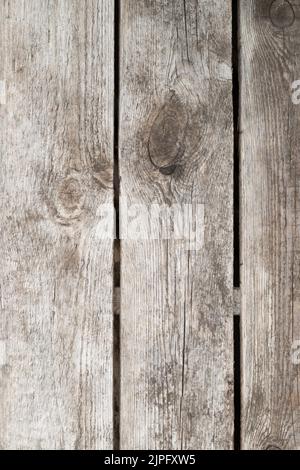 Old rough gray wall or floor texture and the ideal old back surface is a piece of wood. Wheathered piece of wood. Flat lay. View from above. Stock Photo