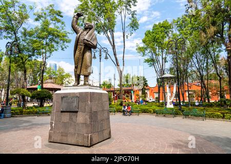 A statue of Hidalgo in Plaza Jardin Hidalgo in Coyoacan, Mexico City, Mexico Stock Photo