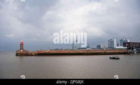 Bremerhaven, Germany. 18th Aug, 2022. The leaning Mole Tower. Parts of the north pier in Bremerhaven caved in during the night on Thursday. The entrance to the Geeste is closed. The ferry service of the Weser ferry also had to be suspended. Credit: Sina Schuldt/dpa/Alamy Live News Stock Photo