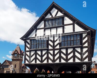 The Market House with Barrett Browning Institute behind on the High Street at Ledbury Herefordshire England Stock Photo