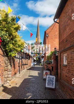 View along Church Land towards the spire of St Michaels Church in Ledbury Herefordshire England Stock Photo
