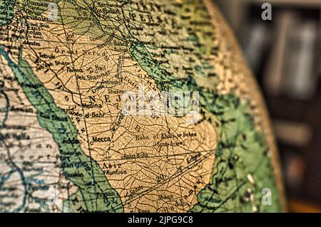 A map of Saudi Arabia / Nejd captured on an antique globe Stock Photo