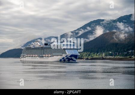 Juneau, Alaska - July 27, 2022: Cruise ship Discovery Princess arriving at Juneau's cruise ship port. Stock Photo