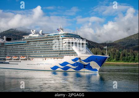 Juneau, Alaska - July 27, 2022: Cruise ship Discovery Princess arriving at Juneau's cruise ship port. Stock Photo