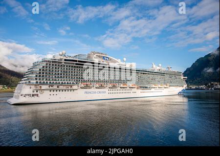 Juneau, Alaska - July 27, 2022: Cruise ship Discovery Princess arriving at Juneau's cruise ship port. Stock Photo