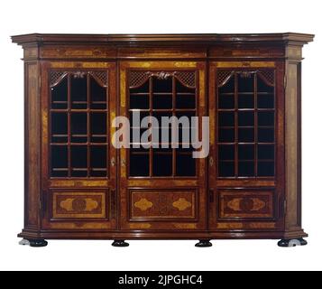Antique huge empty wooden cabinet with glasses door isolated on white with clipping path Stock Photo