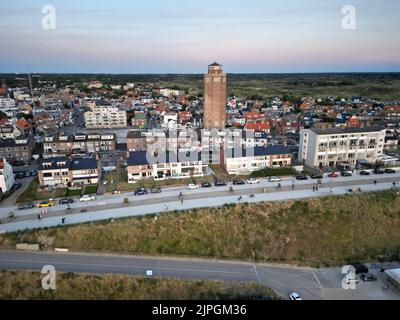 A bird's eye view of houses against a boulevard on Zandvoort beach, the Netherlands at sunset Stock Photo