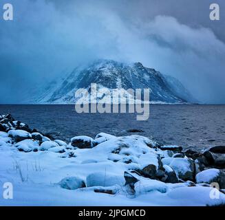 The island of Godøy in winter, Sunnmøre, Møre og Romsdal, Norway. Stock Photo