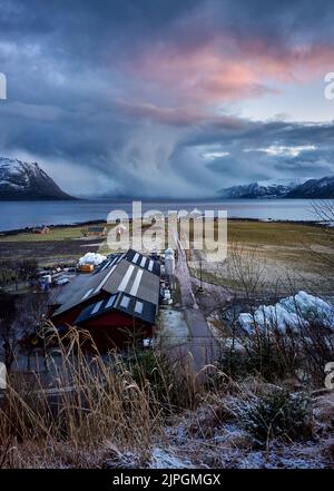 The island of Godøy in winter, Sunnmøre, Møre og Romsdal, Norway. Stock Photo