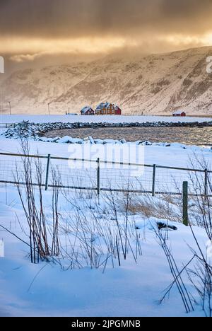 The island of Godøy in winter, Sunnmøre, Møre og Romsdal, Norway. Stock Photo