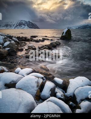 The island of Godøy in winter, Sunnmøre, Møre og Romsdal, Norway. Stock Photo