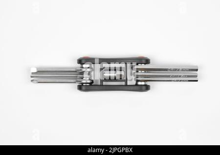 Multitool key for bicycle isolated on white background Stock Photo