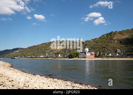 KAUB, GERMANY - AUGUST 13, 2022: Drought in Germany, low water on Rhine river on August 13, 2022 in Kaub, Germany Stock Photo