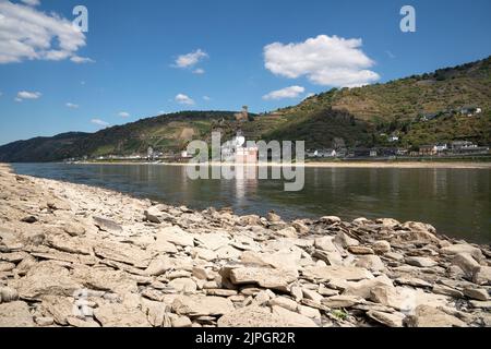 KAUB, GERMANY - AUGUST 13, 2022: Drought in Germany, low water on Rhine river on August 13, 2022 in Kaub, Germany Stock Photo