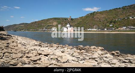 KAUB, GERMANY - AUGUST 13, 2022: Drought in Germany, low water on Rhine river on August 13, 2022 in Kaub, Germany Stock Photo