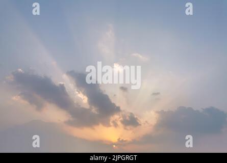 Beautiful sunset sky with some clouds during summer on a nice day Stock Photo