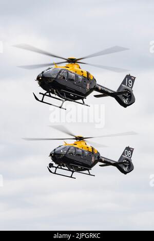 Two Eurocopter EC135 Juno Helicopters from  No. 1 Flying Training School arrive at RAF Fairford for the RIAT Stock Photo