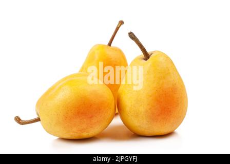 Three yellow ripe pears on white background isolated. Dessert for cooking slice and confectionery. Sweet food, vegetarian. Farm and garden ingredient Stock Photo