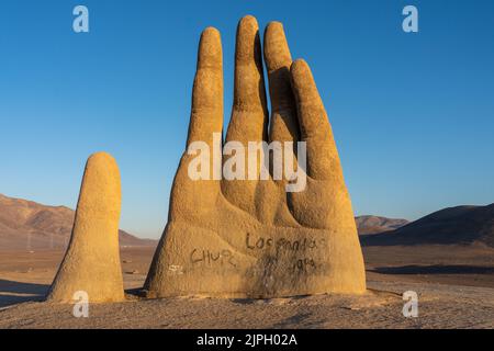The Hand of the Desert or Mano del Desierto near Antofagasta, Chile is a large sculpture constructed by Mario Irrarrazabal. Stock Photo