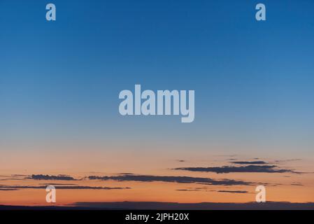 Beautiful evening sky with orange sunset Stock Photo