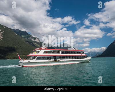 Scenic Lake Achensee at Pertisau in the Karwendel mountains of the Austrian Tirol seen here with one of the lakes pleasure cruise boats Stock Photo