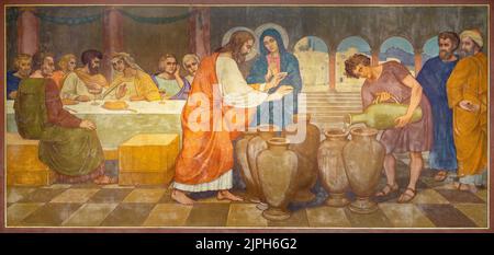 BERN, SWITZERLAND - JUNY 27, 2022: The fresco of  Mirracle at Cana  in the church Dreifaltigkeitskirche by August Müller (1923). Stock Photo