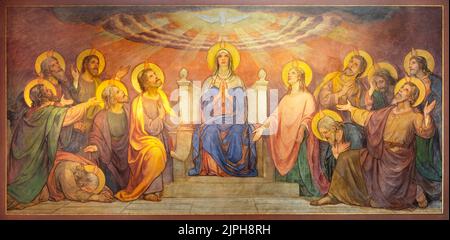 BERN, SWITZERLAND - JUNY 27, 2022: The fresco of Pentecost in the church Dreifaltigkeitskirche by August Müller (1923). Stock Photo