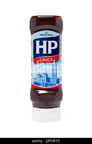 A squeezable plastic bottle of HP brown sauce. Studio shot isolated on white with path cut out Stock Photo