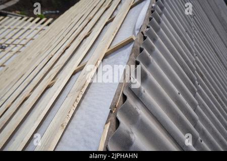 Roof construction and repairing old slate roof Stock Photo