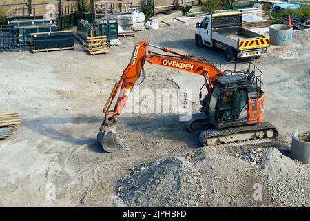 A digger in the building site of the Blueberry Homes Royal Sand development in Ramsgate Stock Photo