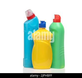 Household cleaning products in plastic bottles isolated on a white background. Colorful plastic bottles product mockup. Stock Photo