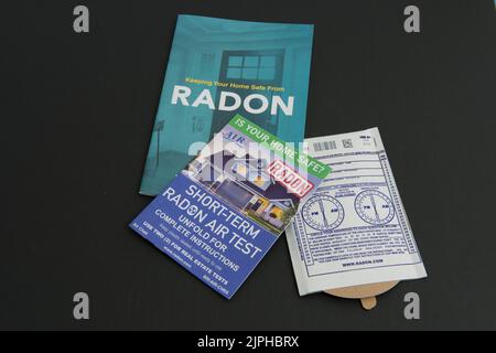 An at home, do it yourself radon testing kit with the informational material on radon and how testing works. Stock Photo