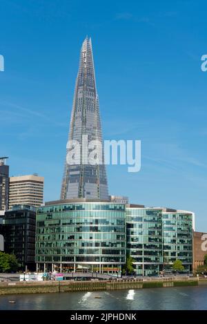 The Shard and More London Riverside modern glass architecture buildings on the South Bank of the River Thames. Stock Photo