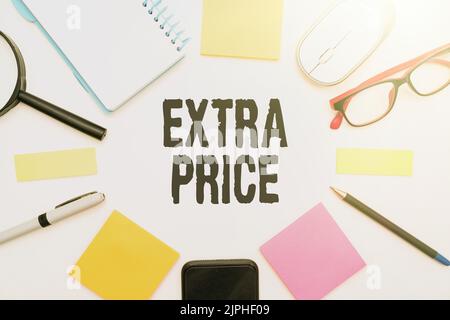 A closeup of flashy school office supplies with text caption presenting extra price Stock Photo