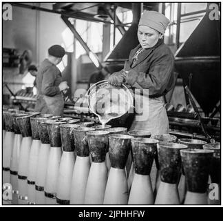 FINLAND MILITARY PRODUCTION 152mm Shell Production In Finland 1942s World War II Pouring of liquid Amatol .Amatol is a highly explosive material made from a mixture of TNT and ammonium nitrate The British name originates from the words ammonium and toluene (the precursor of TNT). Similar mixtures (one part dinitronaphthalene and seven parts ammonium nitrate) were known as Schneiderite in France. Amatol was used extensively during World War I and World War II, typically as an explosive in military weapons such as aircraft bombs, shells, depth charges, and naval mines.. Stock Photo