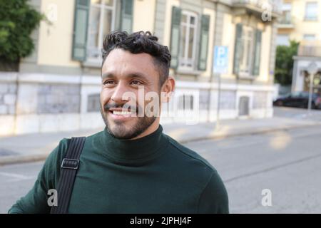 Handsome entrepreneur walking around with elegant turtle neck shirt Stock Photo