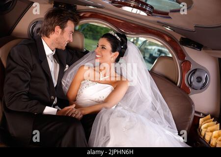 happy, limousine, bridal couple, just married, happies, limo, limos, limousines, bridal couples, just marrieds Stock Photo