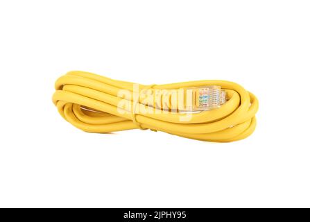 Twisted yellow cable with LAN or Ethernet connectors on a white background. Copy space. Stock Photo