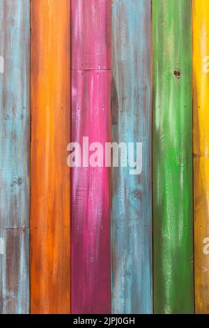 Vertical full frame background of vibrant and multi colored wooden planks with copy space Stock Photo