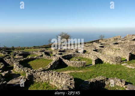 Ruins of ancient celtic settlement stone dwellings in Castro de Santa Trega archaeological site, Pontevedra, Spain Stock Photo