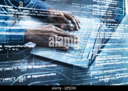 Computer Programmer Writing Program Code On Computer At Night Stock Photo