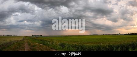 Over the Dutch green countryside, between the cities of Leiden and Gouda we had a great view of a spectaculair thunderstorm Stock Photo