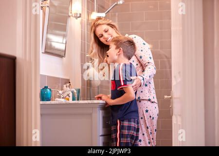 mother, son, brushing teeth, mom, mothers, mum, sons, brushing teeths Stock Photo