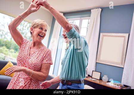 living room, dancing, older couple, living rooms, older couples Stock Photo