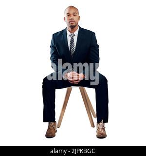 When it comes to business, always dress to impress. Studio shot of a handsome young businessman posing against a white background. Stock Photo