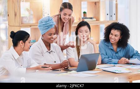 Laptop marketing strategy, branding and promotion project by diverse group of creative agents with vision, plan or idea. United, supportive or Stock Photo