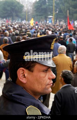 Police officer at political demonstration, Tirana, Albania Stock Photo