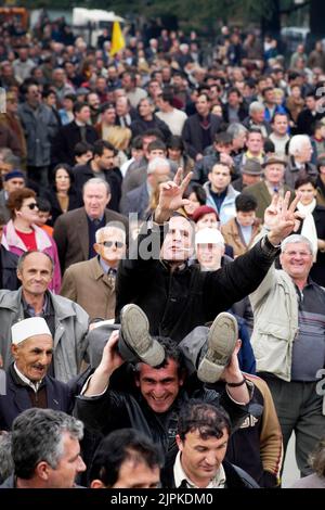 Crowds of people at political demonstration, Tirana, Albania Stock Photo